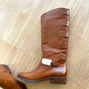 New Franzie leather, man made upper boots. Never worn